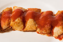 Load image into Gallery viewer, Rice &amp; Ground Beef Cabbage Rolls cooked on a plate
