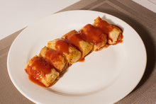 Load image into Gallery viewer, Rice &amp; Bacon Cabbage Rolls cooked on a plate
