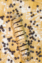 Load image into Gallery viewer, Take-&amp;-Bake Chocolate Chip Cookie Dough log sliced
